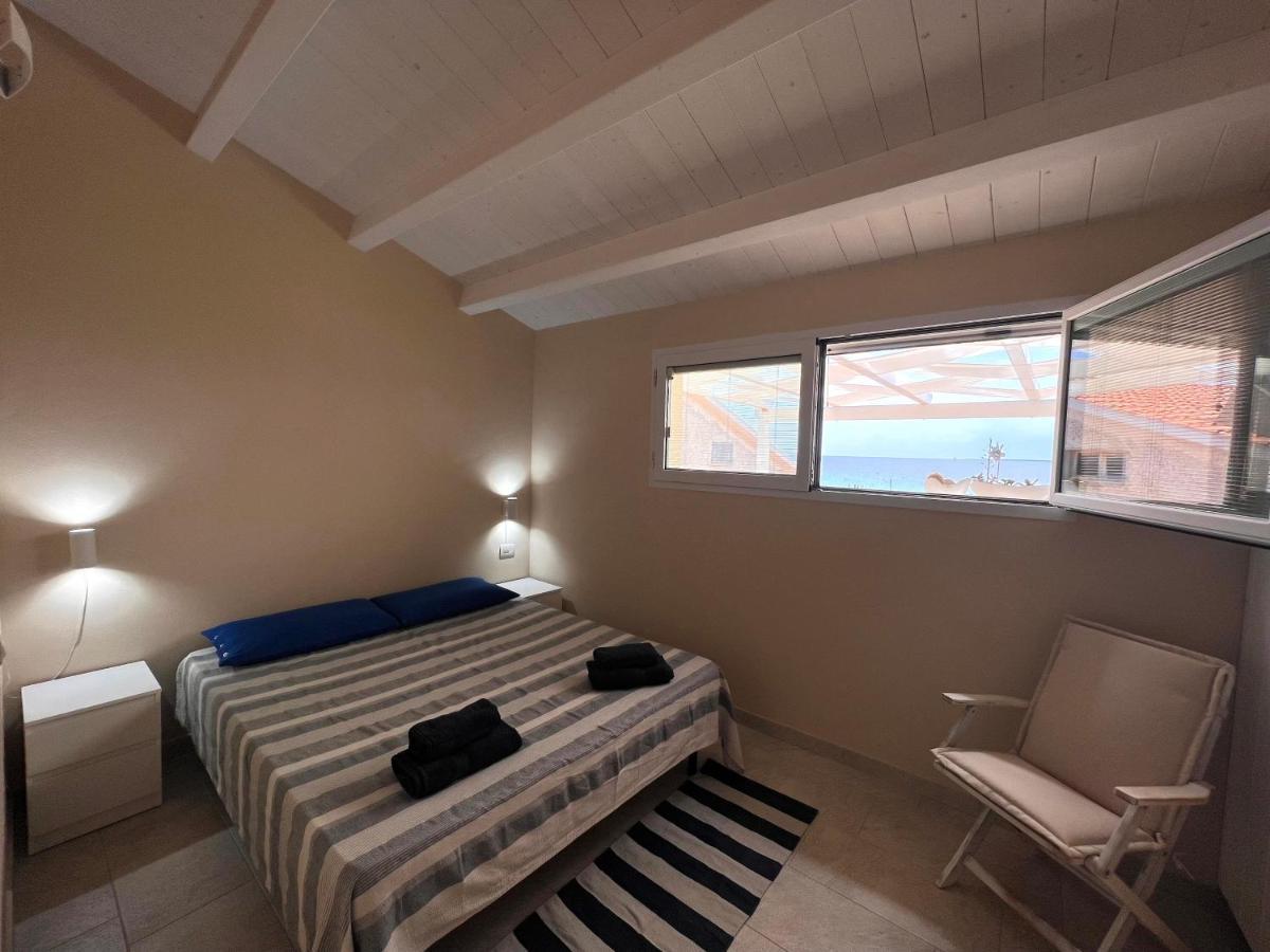 Fronte Mare S'Arena Scoada Apartment Putzu Idu Exterior foto